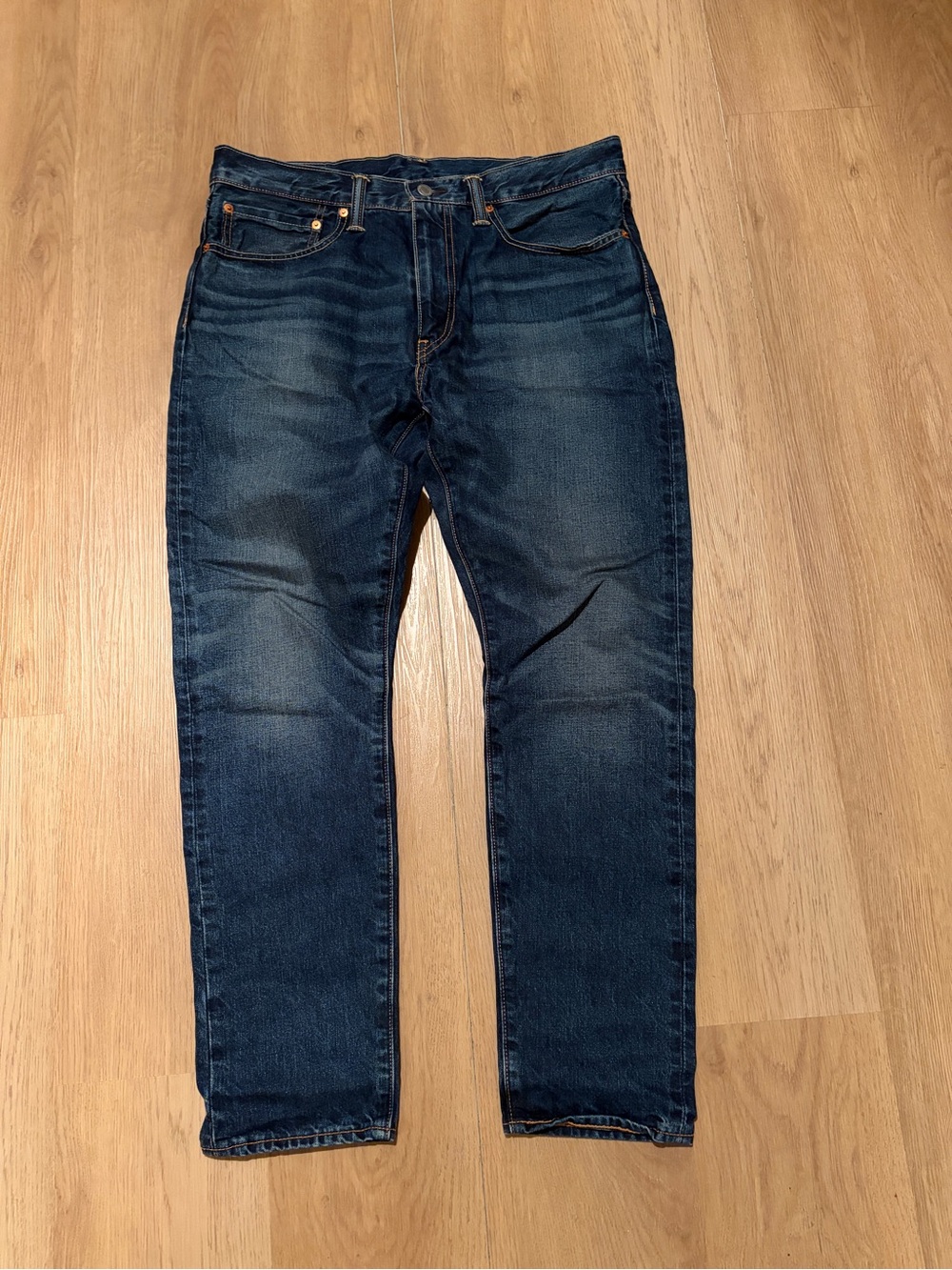 Dark wash Levi’s 512 skinny jeans